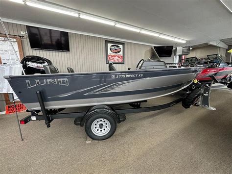 The two boats look identical but you don't see many walleye fisherman with tritons. . Walleye central boats for sale